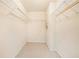 Empty walk-in closet with wire shelving and neutral carpet at 3185 Highgreen Trl, Atlanta, GA 30349