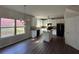 Modern kitchen with white cabinets, granite countertops, a kitchen island, and stainless steel appliances at 4287 Traipse Path, Ellenwood, GA 30294
