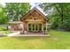 Backyard showing outdoor living area, hot tub and nice landscaping at 1652 Weymouth Ct, Tucker, GA 30084