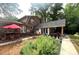 Spacious backyard features a patio, a hot tub, and a relaxing space for outdoor enjoyment at 1652 Weymouth Ct, Tucker, GA 30084
