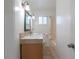 Full bathroom featuring tub with shower, sink, and toilet at 1652 Weymouth Ct, Tucker, GA 30084