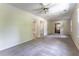 Spacious bedroom with neutral carpet, crown molding, and closet at 1652 Weymouth Ct, Tucker, GA 30084