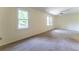Bedroom with natural light and plush carpet at 1652 Weymouth Ct, Tucker, GA 30084