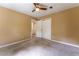 Spacious bedroom with neutral paint and carpet and a ceiling fan at 1652 Weymouth Ct, Tucker, GA 30084