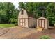 Charming outbuilding features ample storage and a convenient ramp access at 1652 Weymouth Ct, Tucker, GA 30084