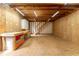 Unfinished outbuilding interior with storage space, workbench and lighting at 1652 Weymouth Ct, Tucker, GA 30084