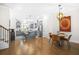 Open-concept living space with an island kitchen featuring stainless appliances and an adjacent dining area at 2744 Bell Se Dr, Smyrna, GA 30080