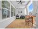 An outdoor porch with wood floors, a grill, and a mounted TV at 2744 Bell Se Dr, Smyrna, GA 30080