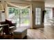 Cozy living room featuring hardwood floors, natural light, and views to the backyard at 2945 Dogwood Creek Parkway, Duluth, GA 30096