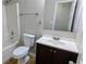 Standard bathroom featuring a shower and tub combination, modern sink and vanity, with neutral wall color at 3881 Micah Ln, Ellenwood, GA 30294