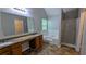 Well-appointed main bathroom with dual sinks, a soaking tub, and a separate shower at 3881 Micah Ln, Ellenwood, GA 30294