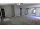 Expansive main bedroom with high ceilings and multiple doors, allowing flexible options at 3881 Micah Ln, Ellenwood, GA 30294