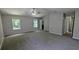 Large main bedroom with vaulted ceilings and multiple windows for natural light at 3881 Micah Ln, Ellenwood, GA 30294