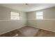 Unfinished basement featuring neutral paint and carpet, ready for personalization at 5372 Martins Crossing Rd, Stone Mountain, GA 30088