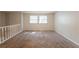 Spacious bonus room with new carpet and large windows at 5372 Martins Crossing Rd, Stone Mountain, GA 30088