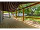This back deck features sturdy wood construction and ample views of the backyard at 638 Medford Se Pl, Smyrna, GA 30080