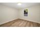 This bedroom has lots of natural light and updated hardwood floors at 638 Medford Se Pl, Smyrna, GA 30080