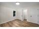 Nice sized bedroom with light walls, hardwood floors, and a walk-in closet at 638 Medford Se Pl, Smyrna, GA 30080