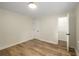 Large bedroom with hardwood floors, and a large walk-in closet at 638 Medford Se Pl, Smyrna, GA 30080