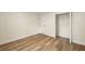 Large bedroom with hardwood floors, and a walk-in closet at 638 Medford Se Pl, Smyrna, GA 30080