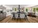 Well-equipped kitchen featuring a large island, stainless steel appliances, and stylish accents for cooking and dining at 638 Medford Se Pl, Smyrna, GA 30080