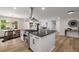 Spacious kitchen with island, stainless steel appliances, view to dining and living room at 638 Medford Se Pl, Smyrna, GA 30080
