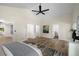 This main bedroom has a ceiling fan, walk in closet, and access to the main bathroom at 638 Medford Se Pl, Smyrna, GA 30080