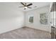 Bright bedroom with two windows and ceiling fan at 808 Angora Aly, Scottdale, GA 30079