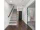 Inviting foyer with hardwood floors, staircase and easy access to rooms on the main floor at 808 Angora Aly, Scottdale, GA 30079