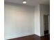 Bright bedroom with a ceiling fan and closet and dark hardwood floor at 1080 Peachtree Ne St # 2915, Atlanta, GA 30309