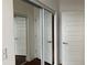 The bedroom features mirrored closet doors which amplify the space, enhancing the sense of openness at 1080 Peachtree Ne St # 2915, Atlanta, GA 30309