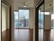 A bedroom offers an inviting space with cityscape views and ample natural light filtering through expansive windows at 1080 Peachtree Ne St # 2915, Atlanta, GA 30309