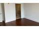 Bedroom that shows entrance to bathroom with stand alone tub and dark wood flooring at 1080 Peachtree Ne St # 2915, Atlanta, GA 30309