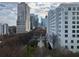 Expansive city view featuring modern architecture and lush greenery at 1080 Peachtree Ne St # 2915, Atlanta, GA 30309