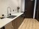 Convenient kitchenette with modern countertops, stainless steel appliances, and ample cabinet space at 1080 Peachtree Ne St # 2915, Atlanta, GA 30309
