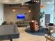 Large lounge area with diverse seating arrangements, a pool table, and attractive decor, ideal for socializing at 1080 Peachtree Ne St # 2915, Atlanta, GA 30309