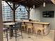 Well-equipped outdoor kitchen with granite countertops and bar seating for entertaining at 1080 Peachtree Ne St # 2915, Atlanta, GA 30309