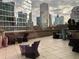 Relax on this outdoor patio with comfortable seating and enjoy stunning city views at 1080 Peachtree Ne St # 2915, Atlanta, GA 30309