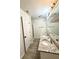Bathroom with double vanity, granite countertops, and walk-in shower at 1700 Devon Sw Dr, Atlanta, GA 30311