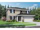 Charming two-story home with brick accents, lush landscaping, and a two-car garage at 3 Roving Hills Cir, Cartersville, GA 30121
