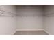 Empty walk-in closet with shelving and carpet at 3 Roving Hills Cir, Cartersville, GA 30121