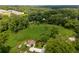 Aerial view of a home nestled among the trees at 445 Brownell Ave, Scottdale, GA 30079