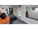 View of the basement bedroom showcasing the closet, decor, and outdoor access through a door at 445 Brownell Ave, Scottdale, GA 30079