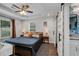 Inviting bedroom with natural light, closet barn doors, and modern décor elements at 445 Brownell Ave, Scottdale, GA 30079
