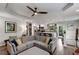 Comfortable living room showcasing stylish furniture and a seamless transition to the kitchen at 445 Brownell Ave, Scottdale, GA 30079