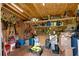 Well organized shed interior with tools, shelves, and ample storage space at 445 Brownell Ave, Scottdale, GA 30079