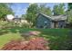Lush backyard featuring a patio and fenced perimeter with mature landscaping for added privacy at 1650 Tomahawk Trl, Cumming, GA 30041