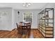 Cozy dining area with table, seating for four, and natural light at 1650 Tomahawk Trl, Cumming, GA 30041