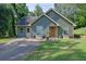 Charming single-Gathering home featuring a well-maintained lawn and ample parking space at 1650 Tomahawk Trl, Cumming, GA 30041