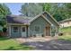 Charming single-Gathering home featuring a well-maintained lawn and ample parking space at 1650 Tomahawk Trl, Cumming, GA 30041